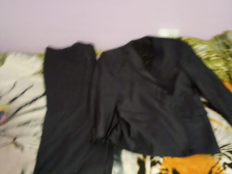 Zapato de cuero y traje de vestir 1 postura